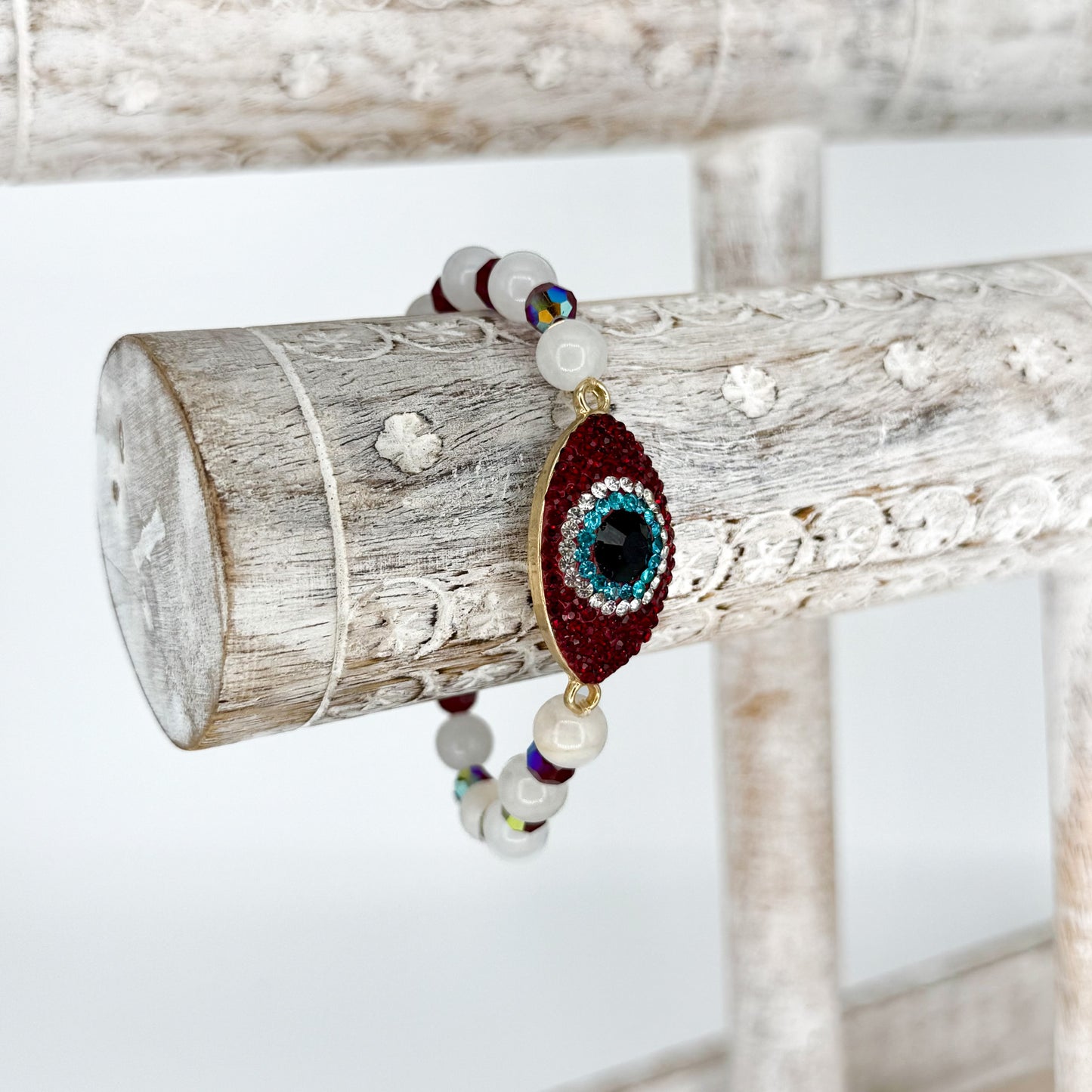 Quartz Bracelet with Large Red Evil Eye - Esu Abita Botanica